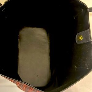 Cute Brown and orange zigzag design tote . Man-made material. 12”by 12”